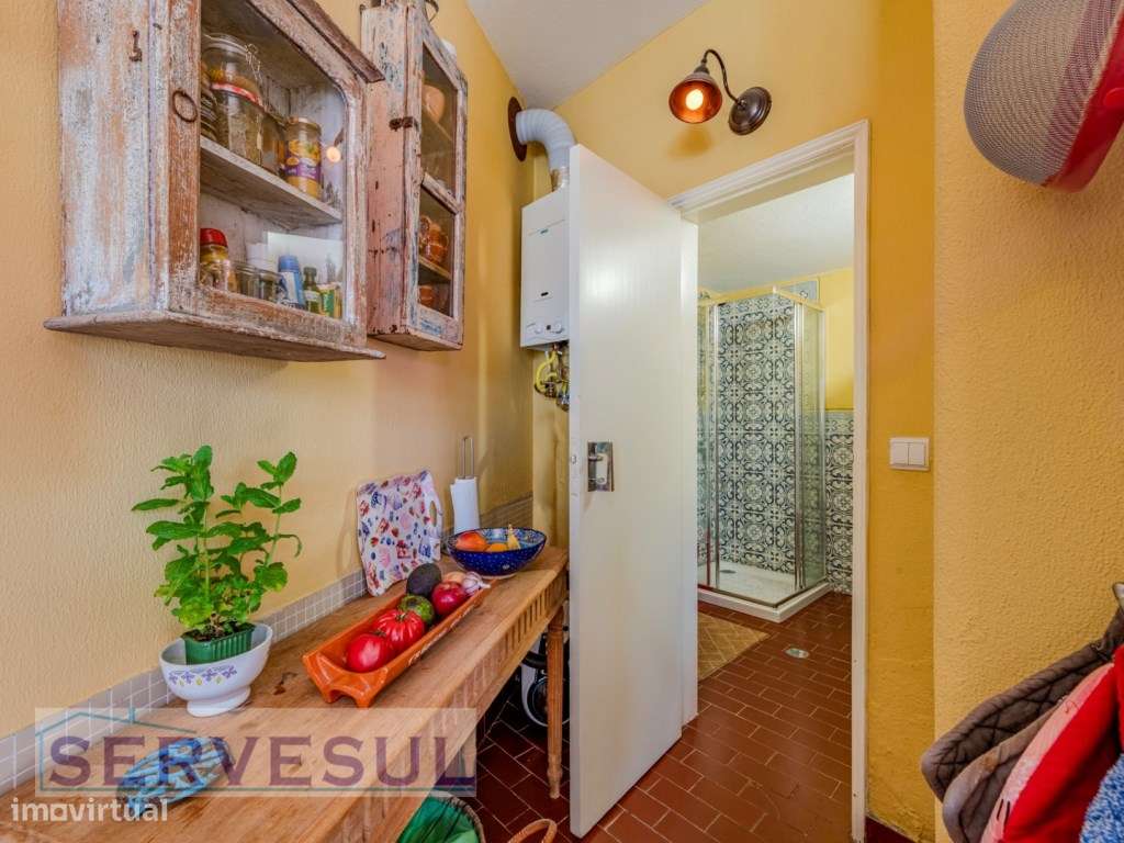Charmosa moradia de 2 quartos de 121 m², inserida num terreno com 2...-12