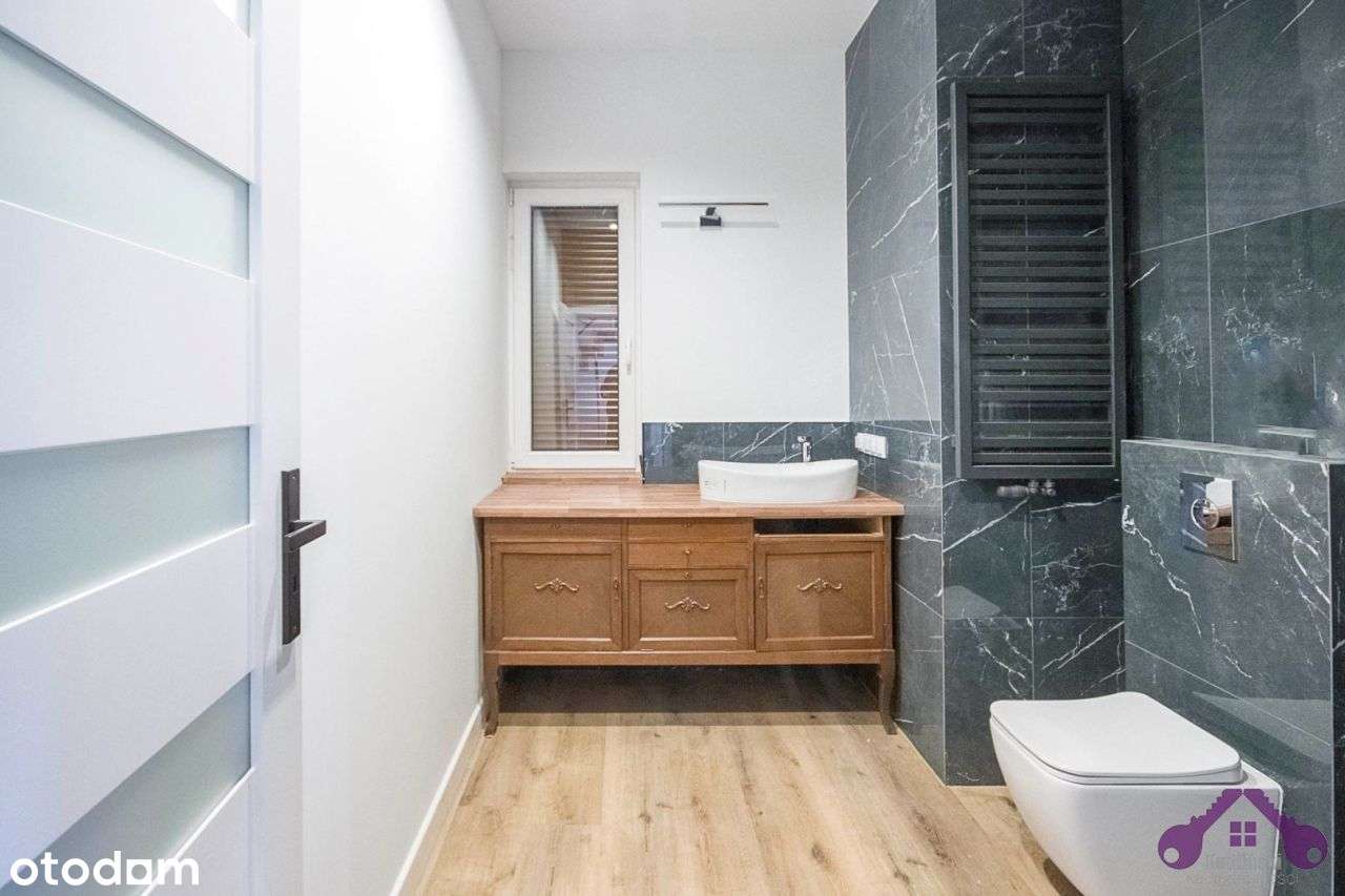 Rezydencjonalny bliźniak na granicy Poznania-8