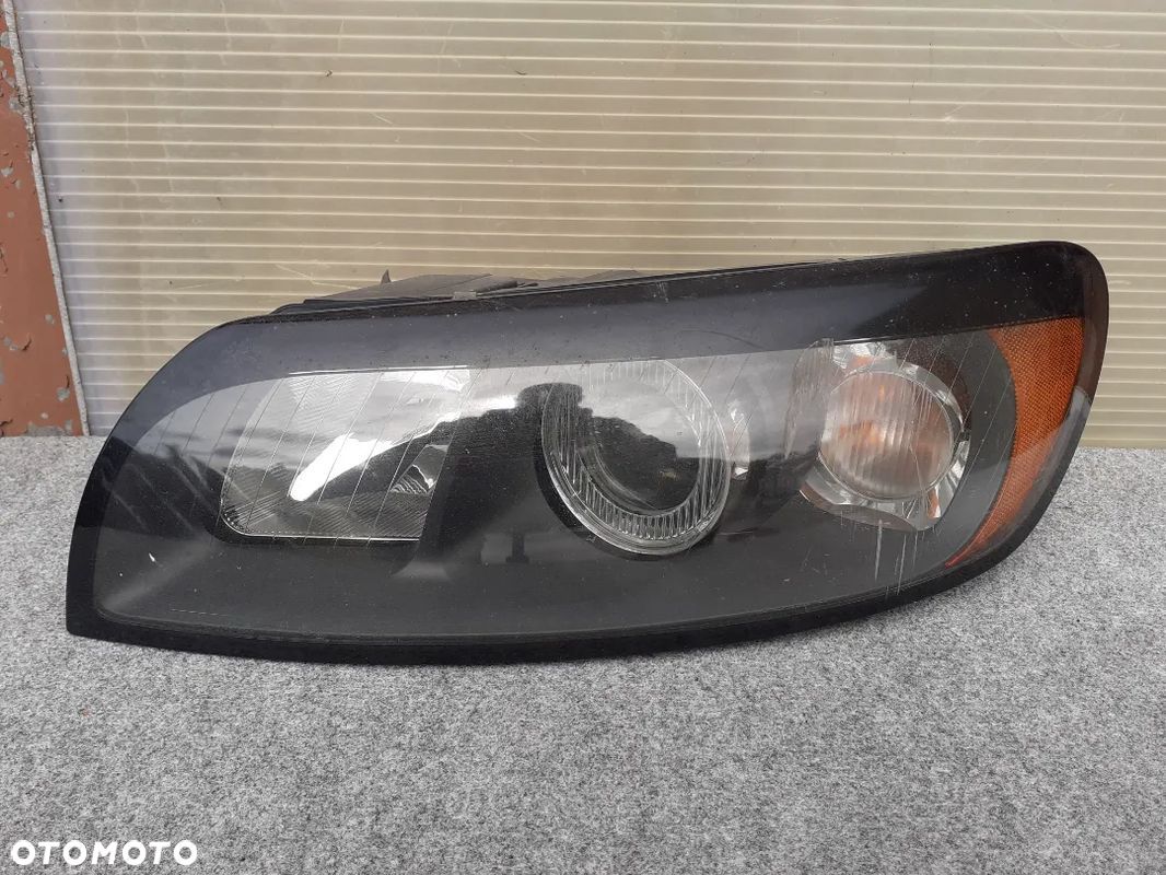 LAMPA PRZÓD PRZEDNIA LEWA VOLVO C30 USZKODZONA ORYGINAŁ WYSYŁKA! - 1