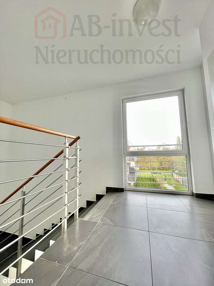 Kawalerka z miejscem postojowym na zamkniętym os.-12