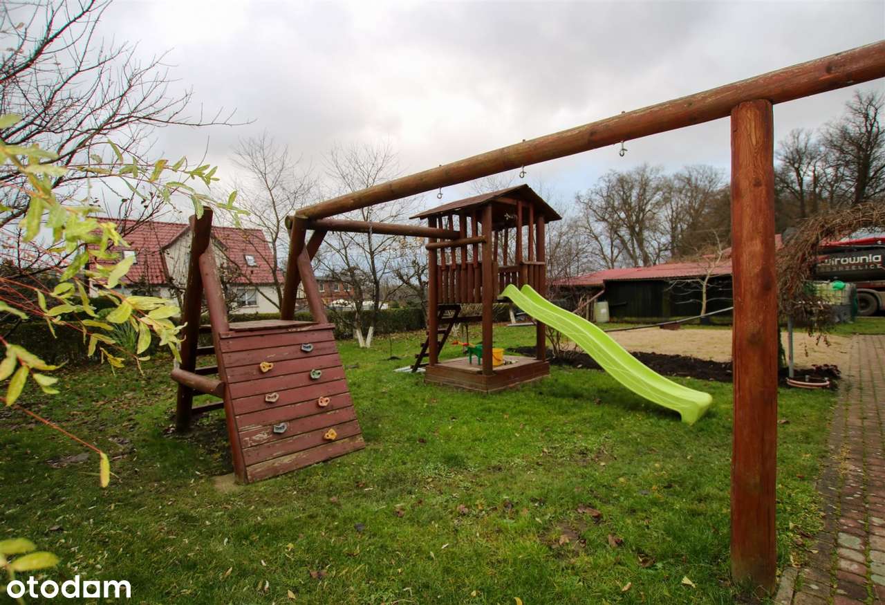 mieszkanie z ogródkiem, budynkiem gosp. + garaże-18