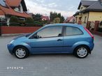 Ford Fiesta 1.4 Ghia - 11