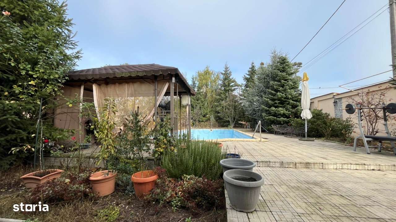 Vila deosebita cu piscina si teren generos Buftea zona exclusivista - Imagine principală: 4/15