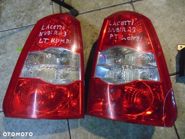 Lampy tył chevrolet lacetti kombi uszkodzona 100 zł - 7