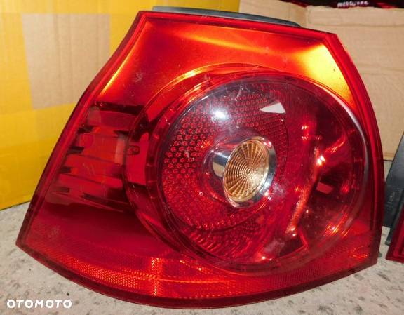 lampa lewa VW GOLF V hb Europa - 1