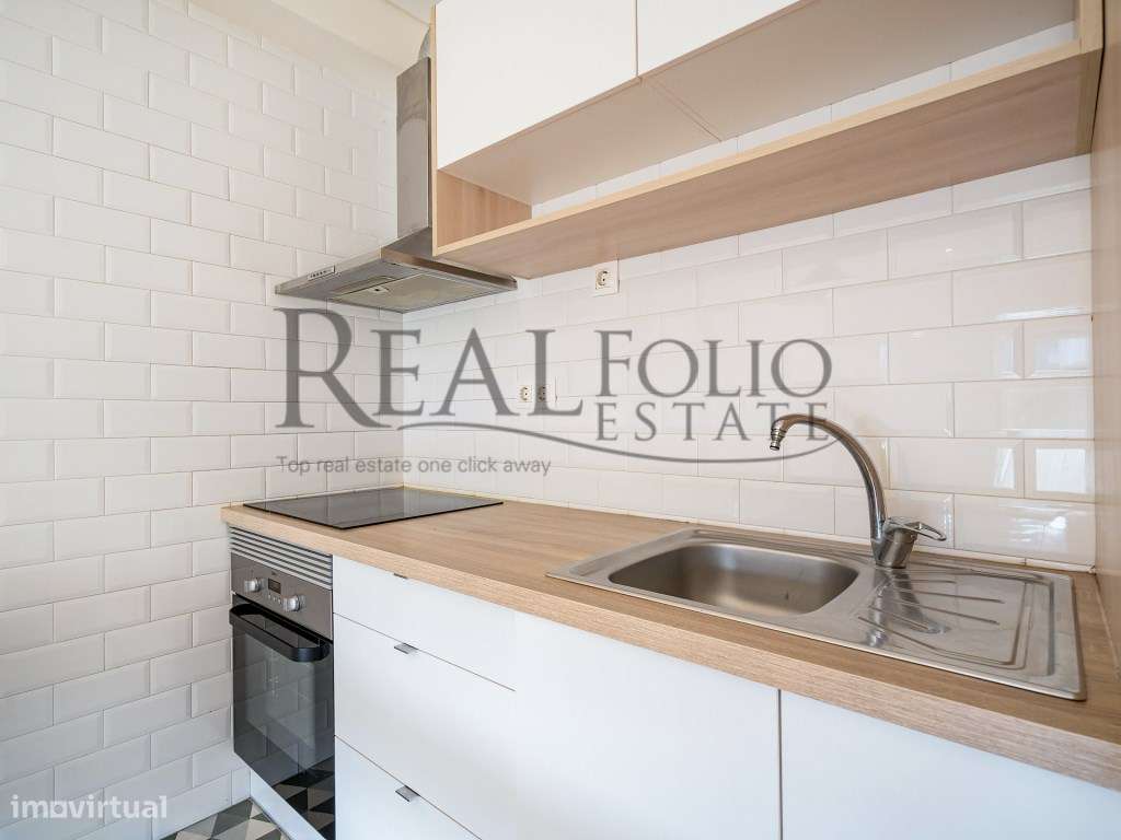Apartamento T1 remodelado com varanda na Costa da Caparica-6