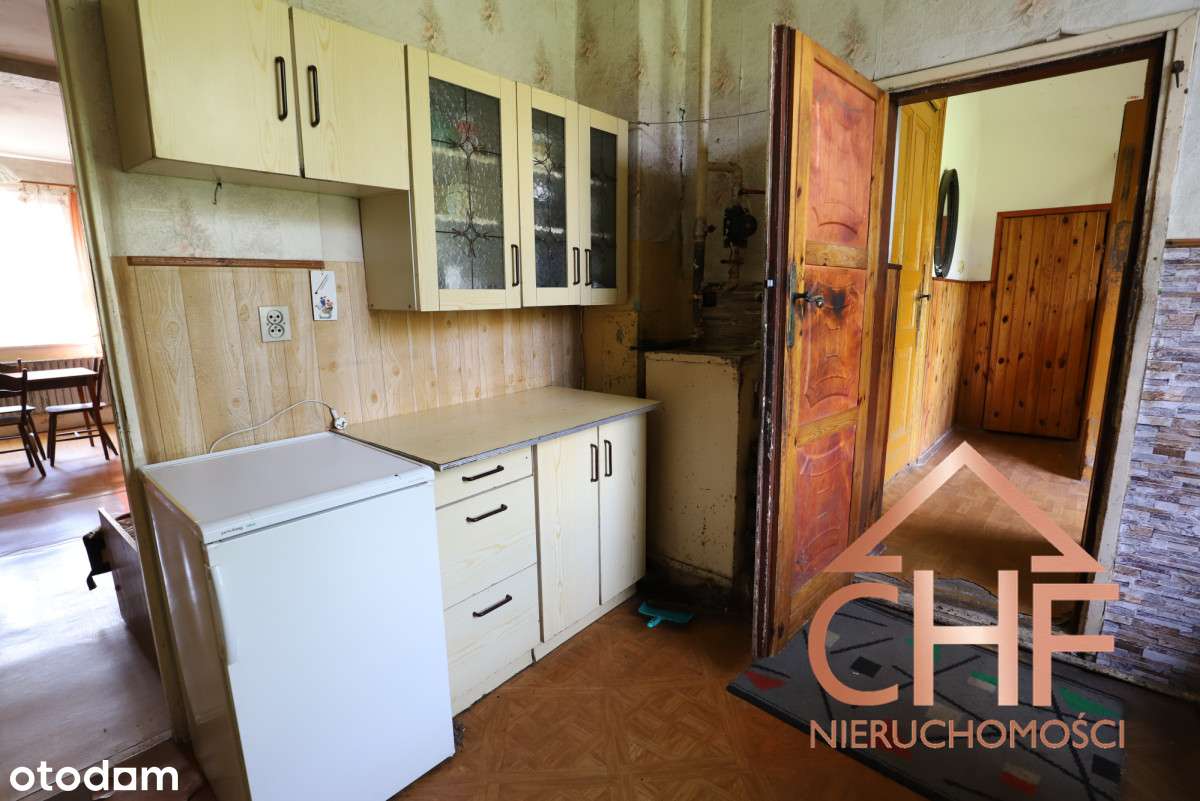 Dom parterowy z pomieszczeniami gospodarczymi-12