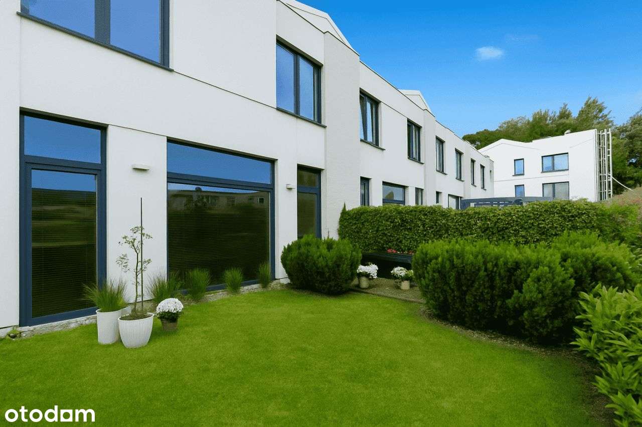 Dom w zabudowie szeregowej wraz z ogrodem i garaże-18