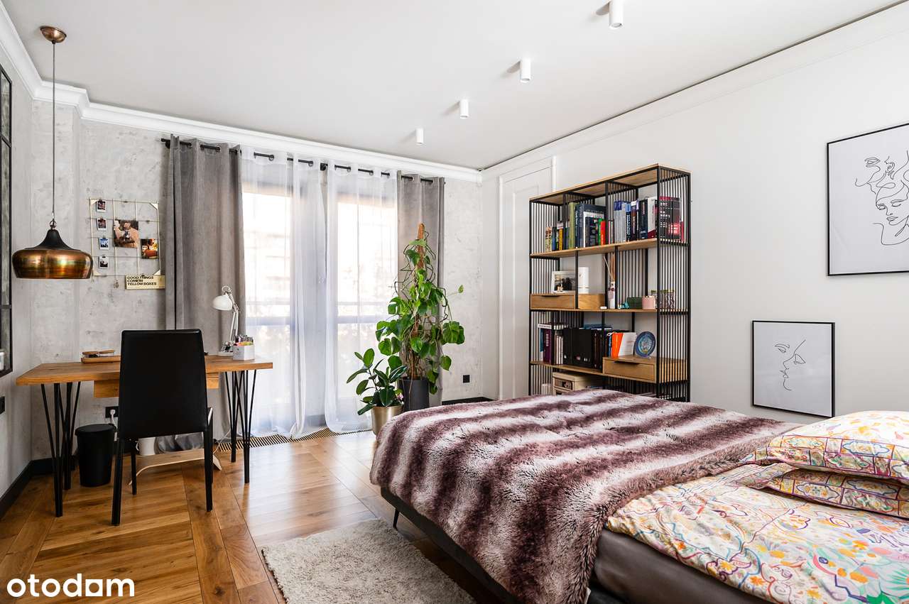 Apartament, który nie próbuje się podobać. On po prostu robi wrażenie.-18