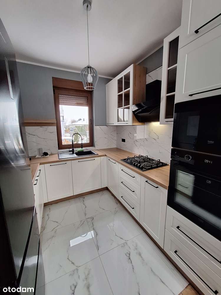 Zadbany dom 130m2 z piękną działką na kameralnej uliczce w Skokach-0