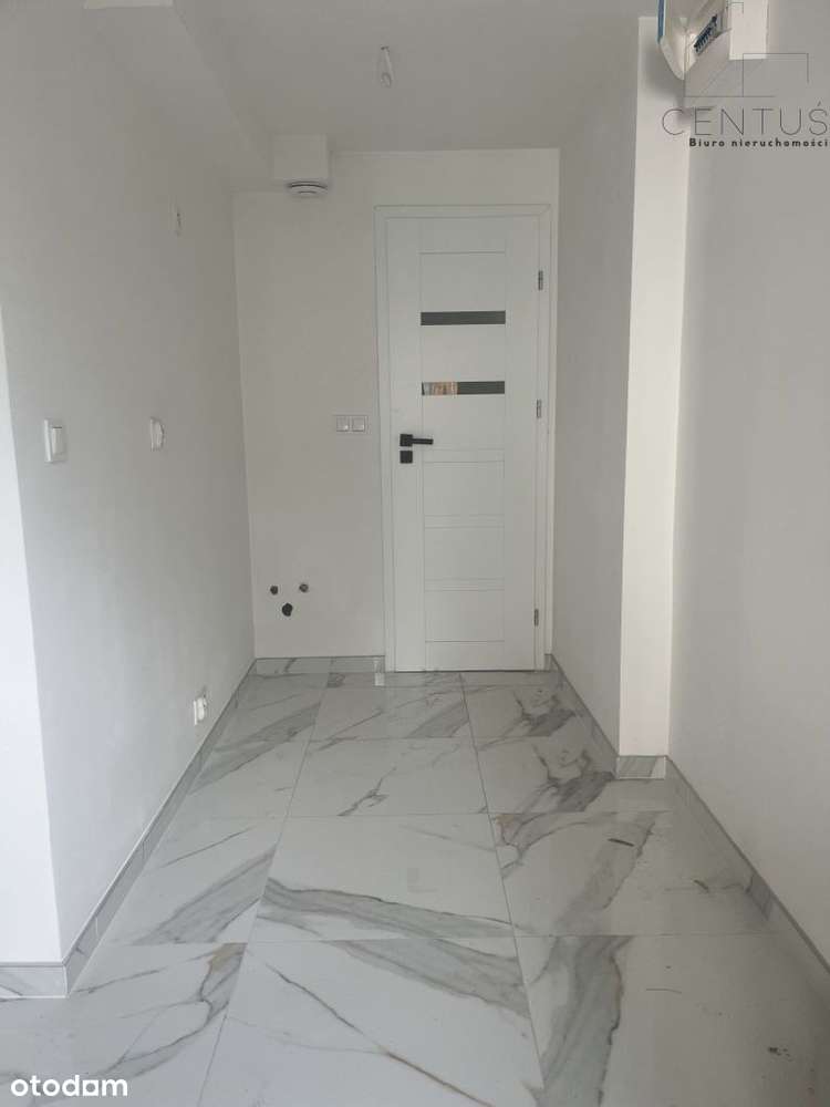 Kawalerka z miejscem postojowym-1