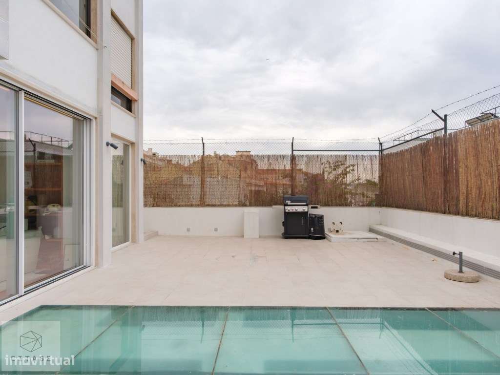 Apartamento T4 com garagem e terraço em Belem-39