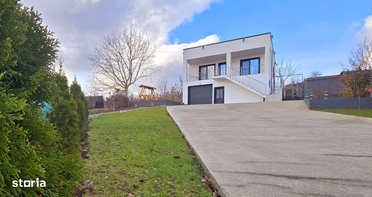 Vila 4 camere, Garaj, 2 bai, SU 210mp, teren 1000mp, CIURBESTI lac-0