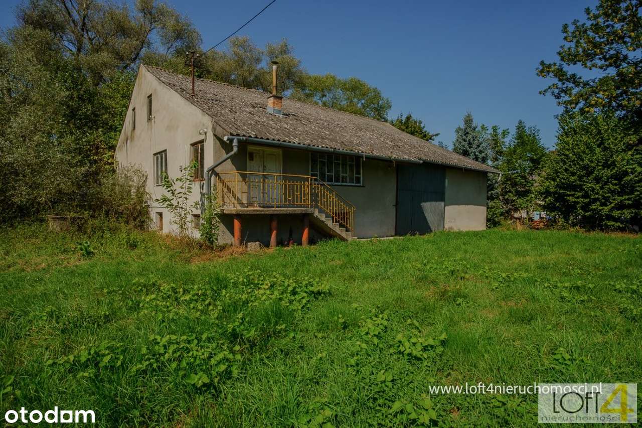Dom z piękną 70 arową działką w Szczurowej