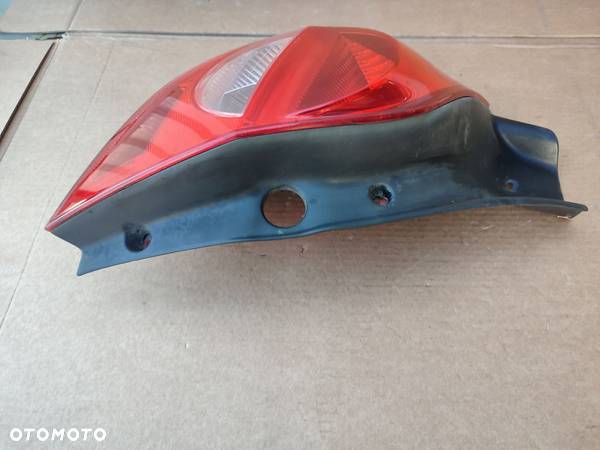 Lampa lewy tył RENAULT CLIO III 3DRZWI EUROPA ORYGINAŁ 89035079 - 6