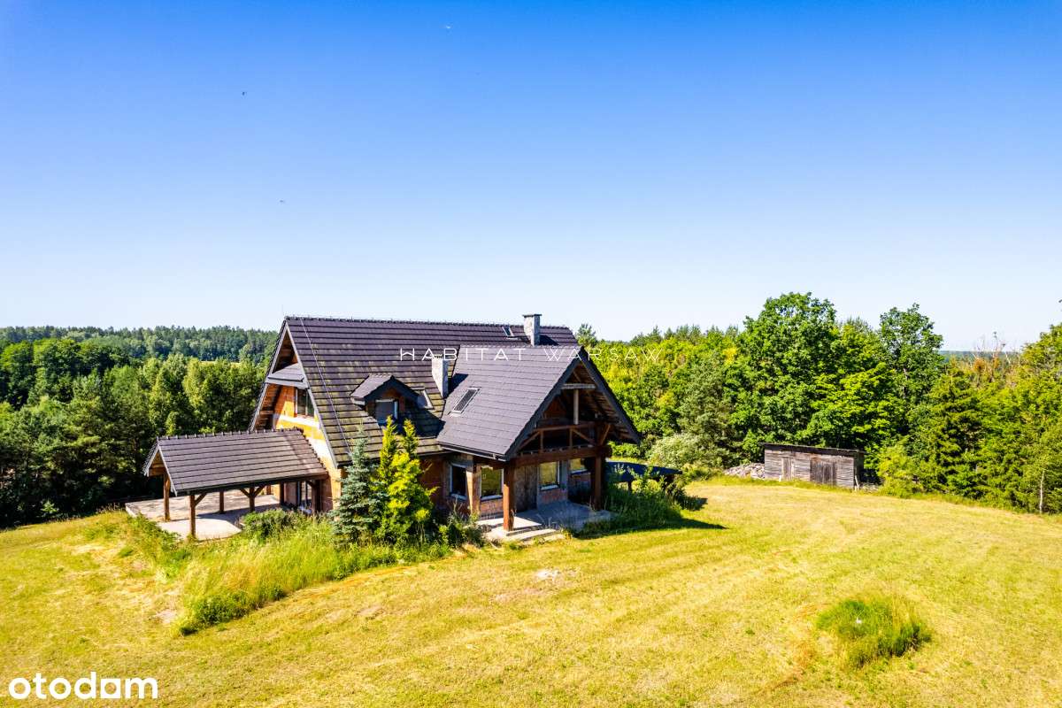 Dom z potencjałem w otoczeniu jeziora i lasu-15