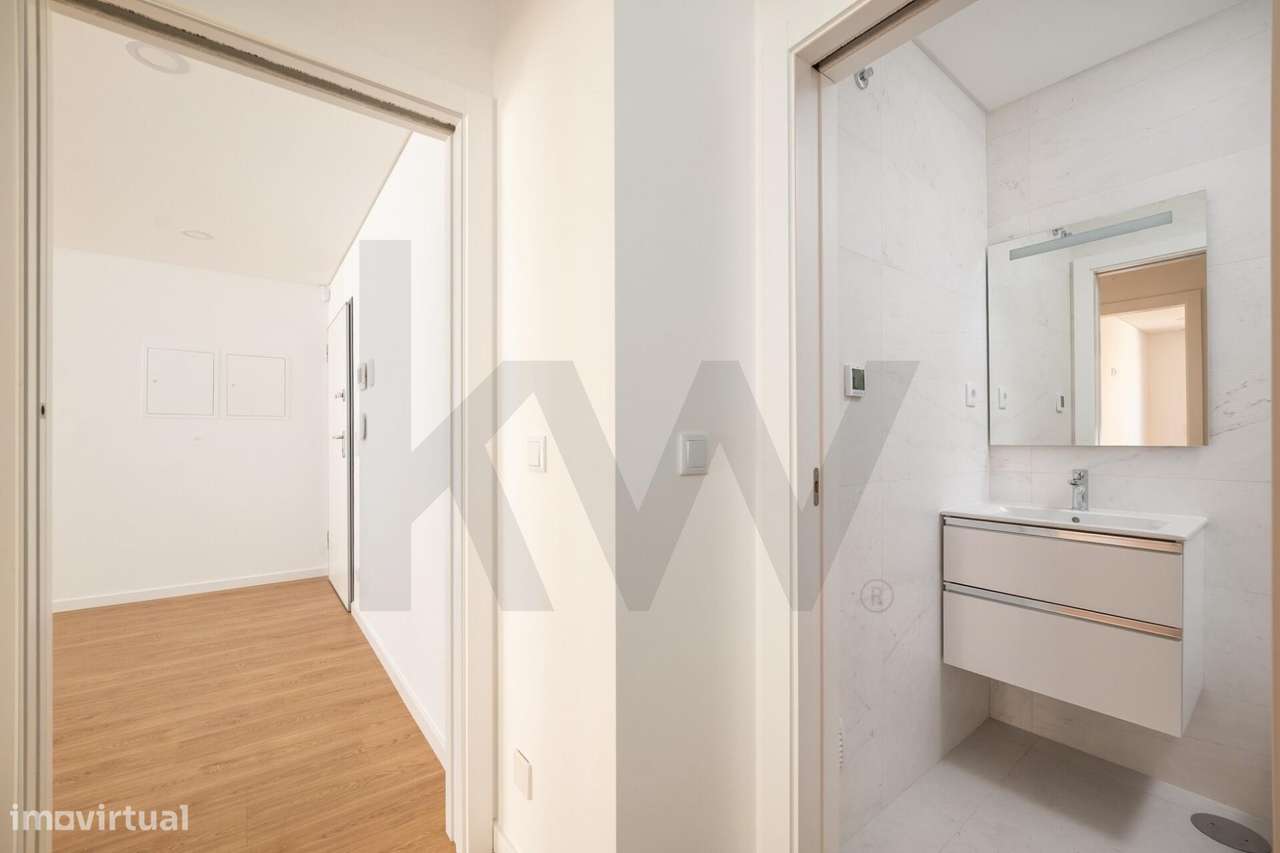 Luminoso Apartamento T2 NOVO com Terraço e Garagem Fechada — Quinta de-9