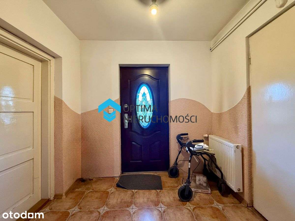 Dom z potencjałem w spokojnej dzielnicy-10