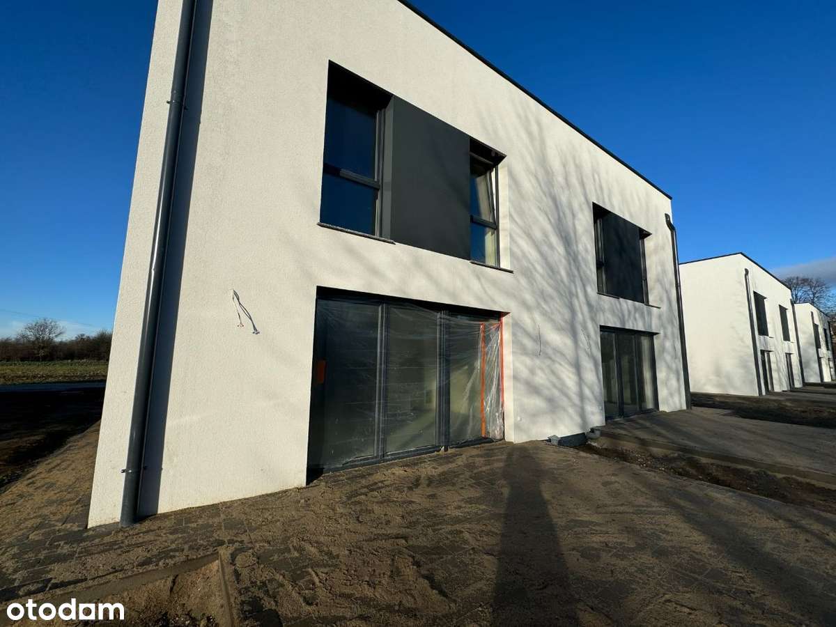 Nowoczesny dom z ogrodem w otoczeniu zieleni-4