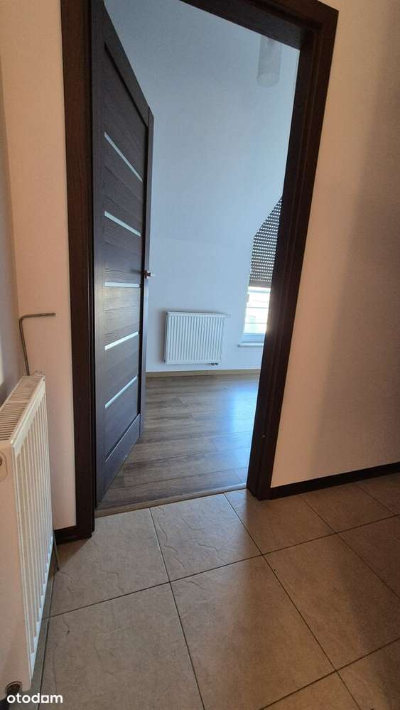 dwupoziomowe z ogródkiem i garażem na Plewiskach-8