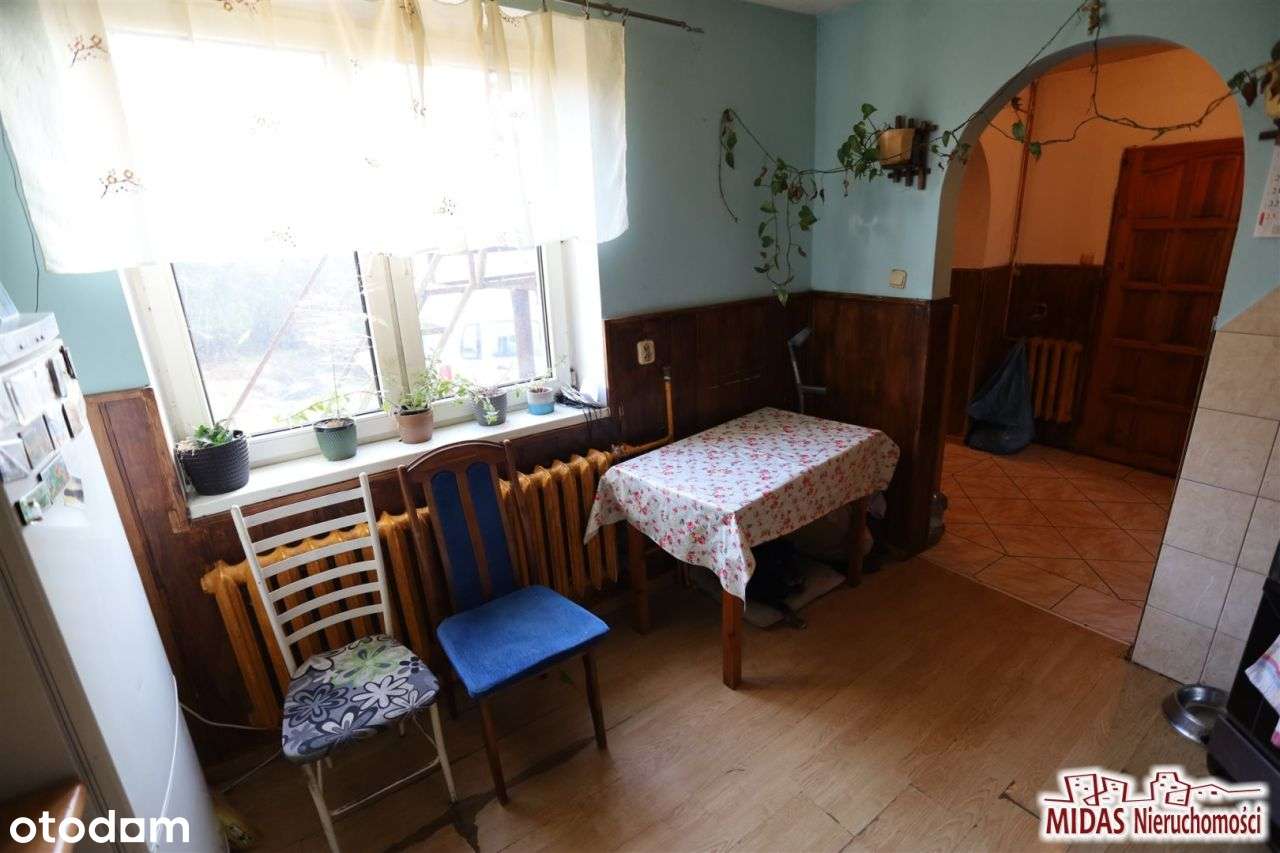 Dom do remontu na ładnej działce-11