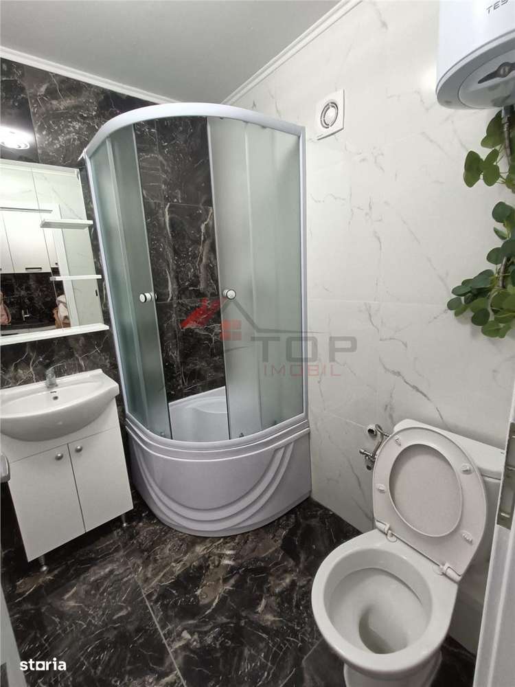 Vanzare garsoniera transformata din camera de camin - Imagine principală: 4/6