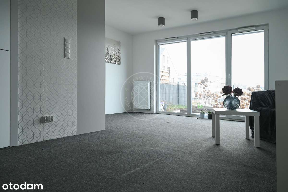 Kawalerka z ogródkiem + miejsce parkingowe!-9