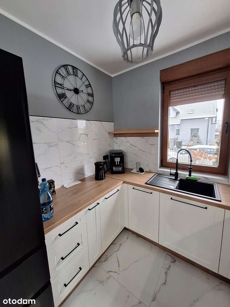 Zadbany dom 130m2 z piękną działką na kameralnej uliczce w Skokach-1