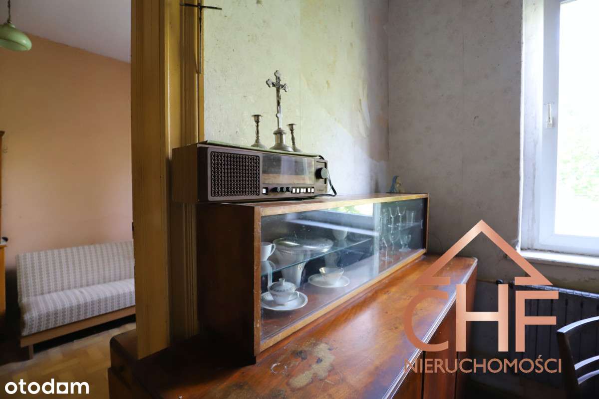 Dom parterowy z pomieszczeniami gospodarczymi-19