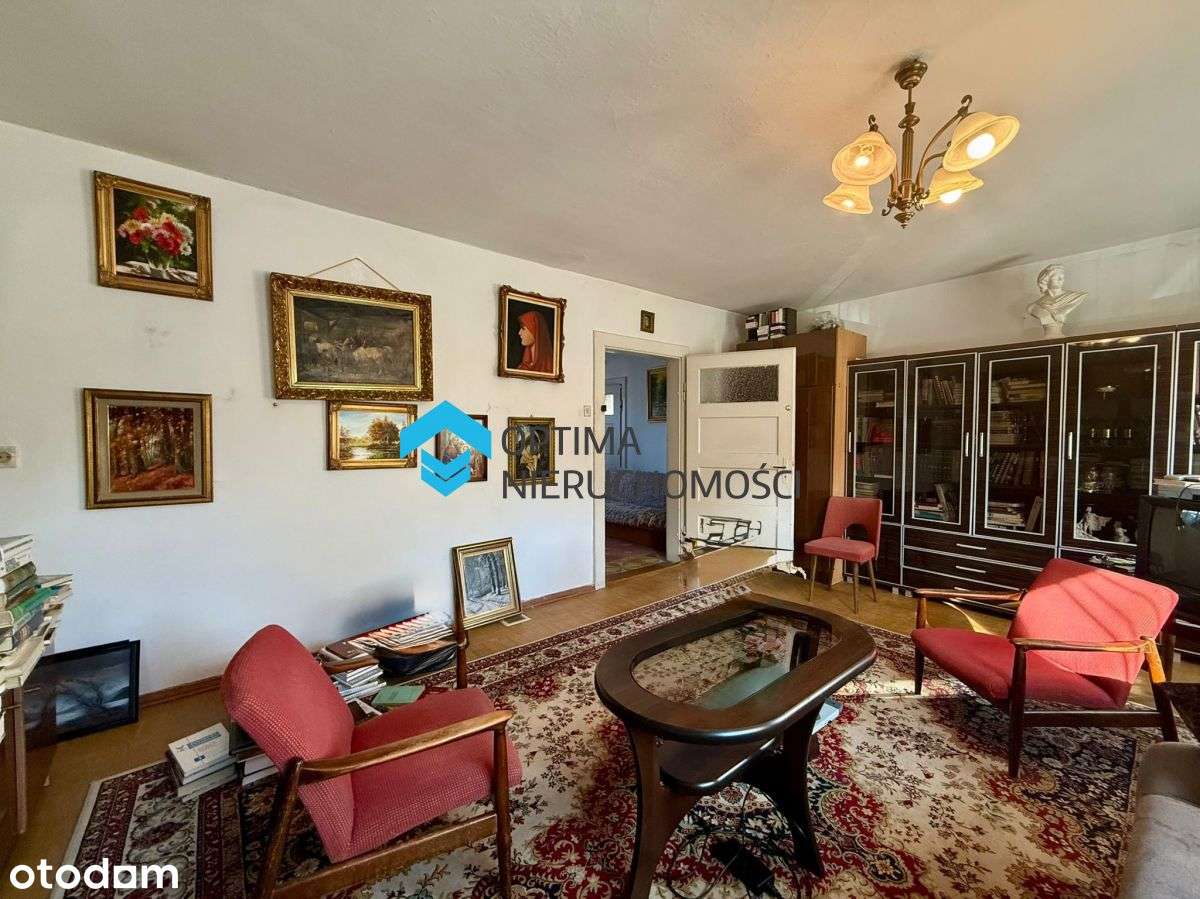 Dom z potencjałem w spokojnej dzielnicy-13