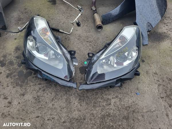 Vand faruri Renault Clio 3 din 2009 - 1