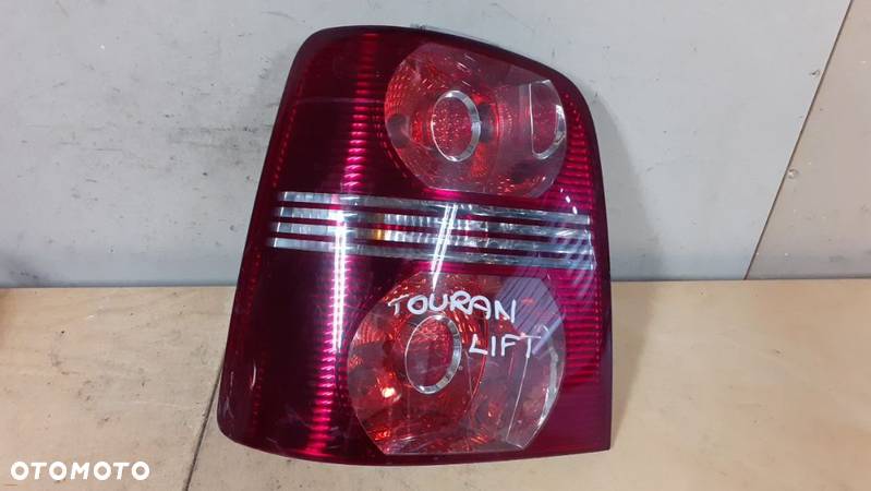 LAMPA TYŁ TYLNA LEWA VOLKSWAGEN TOURAN LIFT 06-10 - 1