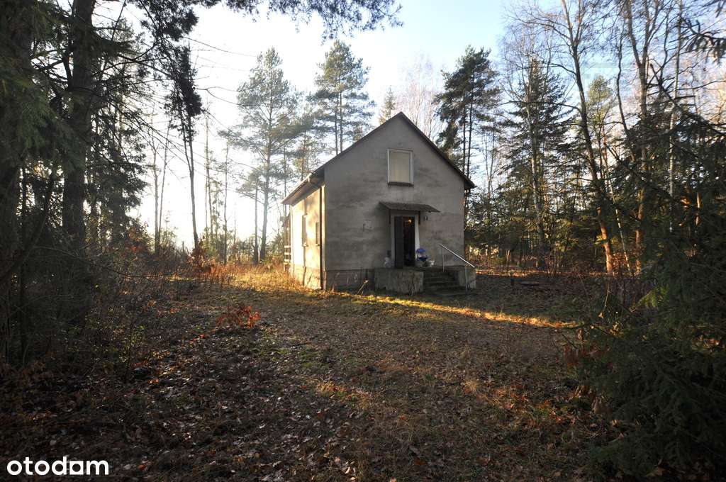 Działka z murowanym domem letniskowym-1