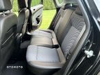 Opel Astra IV 1.4 T Cosmo - 32