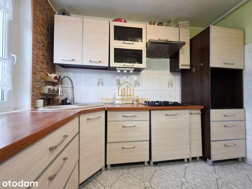 2 pokoje z dużym balkonem i piwnicą-7