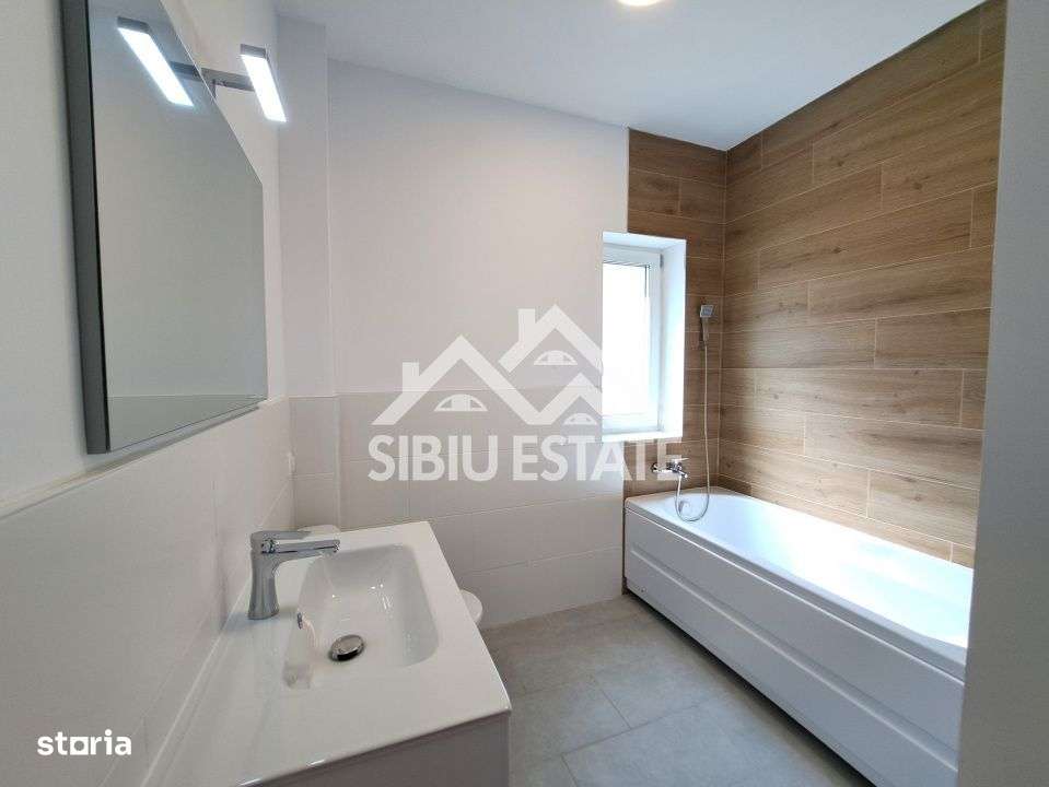 Apartament 61 mp modern finisat la cheie, gradina si terasa Selimbar - Imagine principală: 4/14