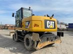 Caterpillar M313D - 5