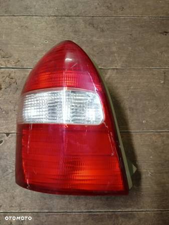 LAMPA TYLNA LEWA MAZDA 323F 98-00 BJ - 2