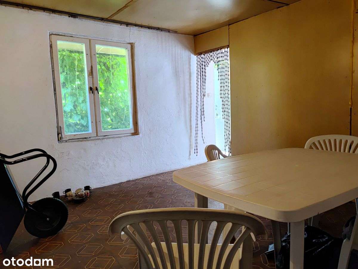 Działka z murowanym domkiem.-7