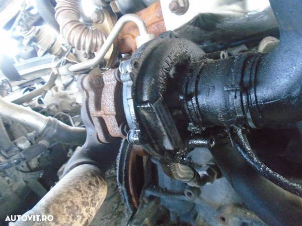 Turbo Volkswagen Polo 1.4 TDI BNM din 2006 - 1