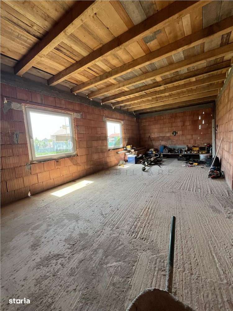 RECO Casa la rosu, la iesire din Les, langa padure - Imagine principală: 4/12