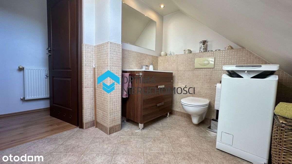 Przytulne mieszkanie z wiatą garażową-15