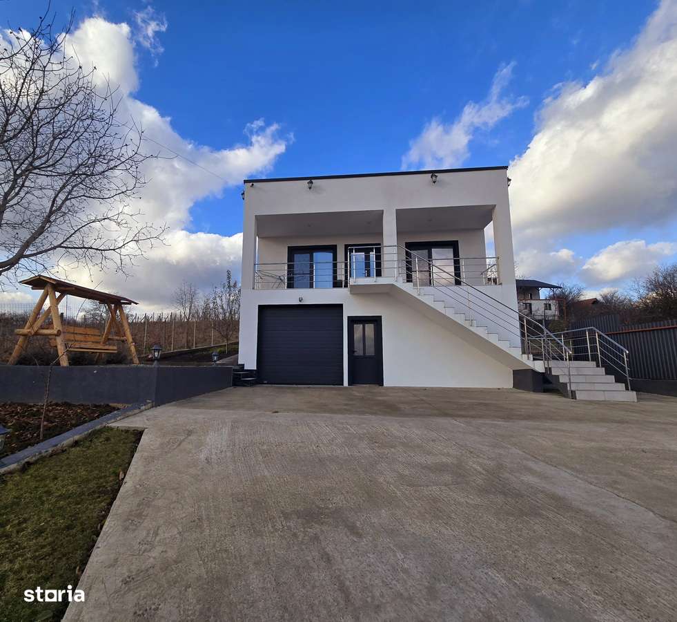 CASA MODERNA 4 camere 2 bai 210 mp Garaj Teren 1050 mp CIURBESTI-1