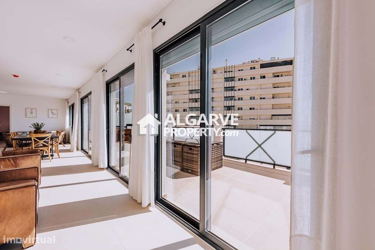Moderno T3 no Centro de Faro com Garagem e Excelentes Acessos - Grande imagem: 5/48