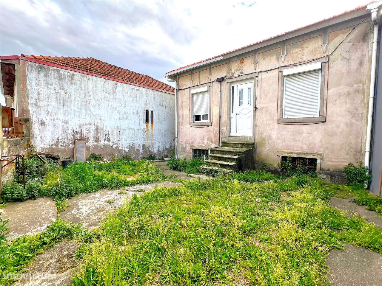 Moradia para reabilitar ou aumentar num lote de 429 m2 em Aldoar - Grande imagem: 4/13