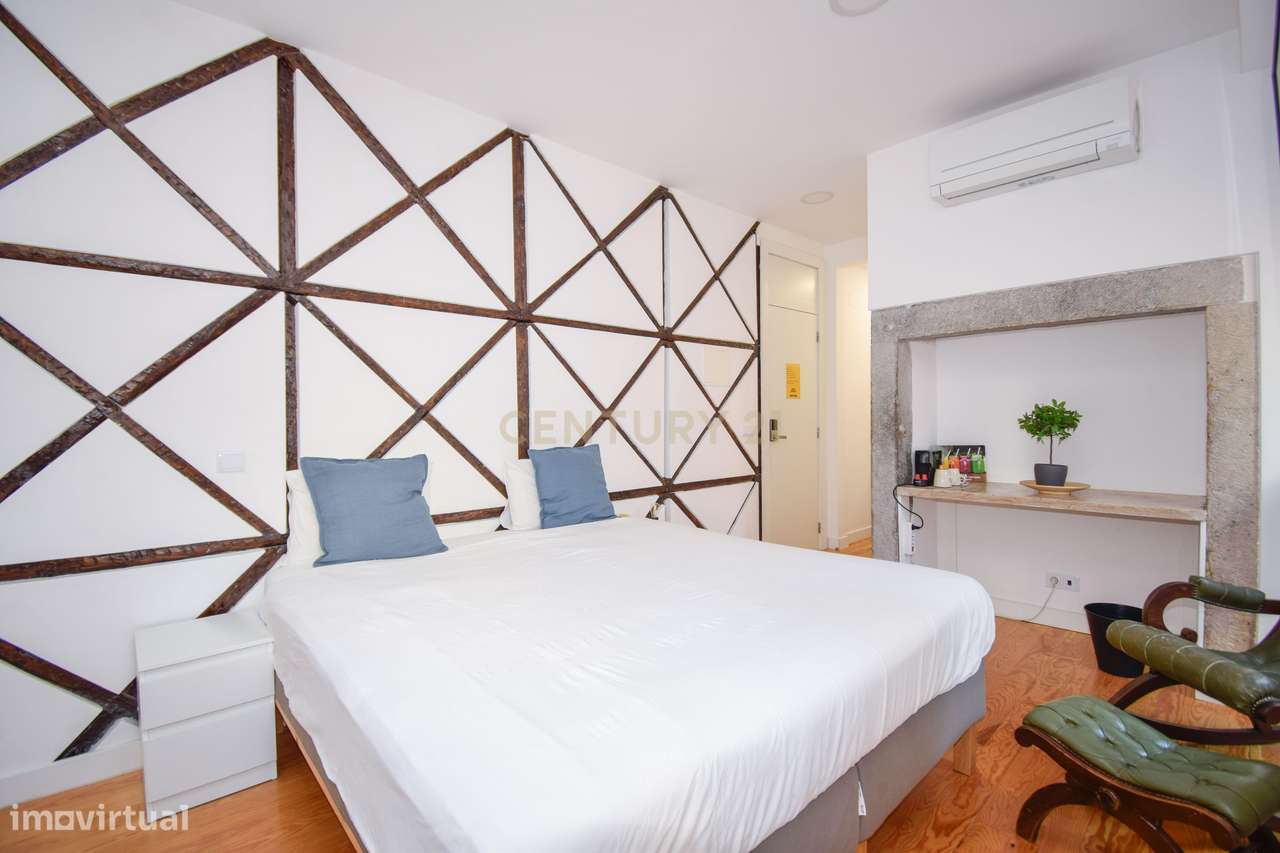 T2 afecto a AL, transformado em 4 suites, na Rua dos Fanqueiros - Grande imagem: 4/27