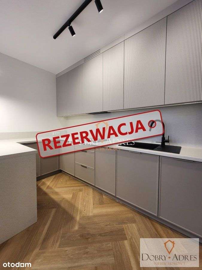 3 pokojowy apartament + m. postojowe w garażu + ko-1