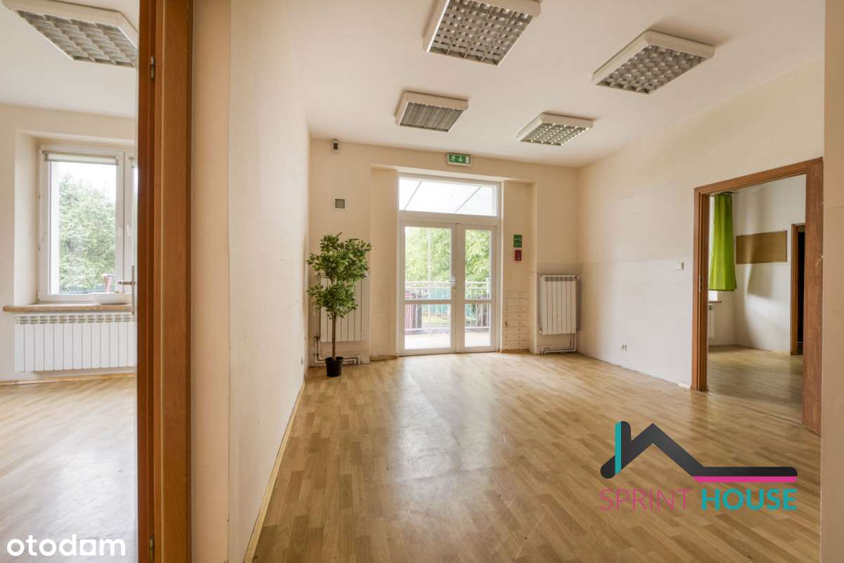 Przestronne mieszkanie z ogrodem!-1