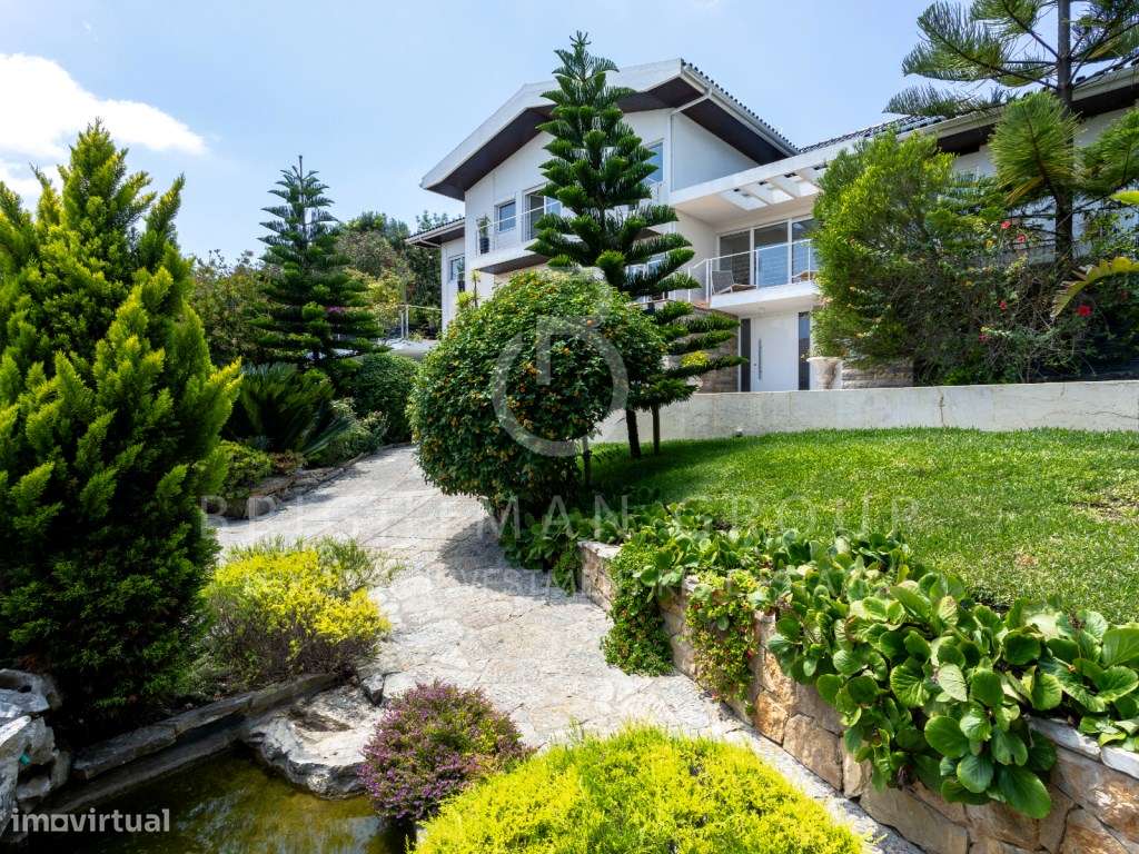 Moradia T6 com jardins, piscina e vista rio no Restelo - Grande imagem: 2/60