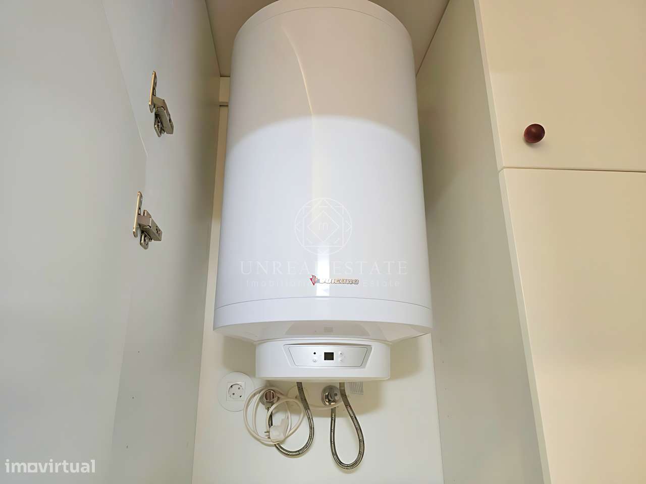 Apartamento T0 , novo, inserido em um edifício totalmente remodelado n-21